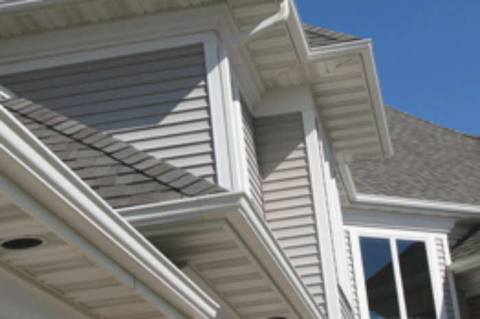 Rollex Aluminum Soffit And Steel Siding Beautifully Protects Your Home For Decades Green Roof House Metal Roof Houses House Paint Exterior